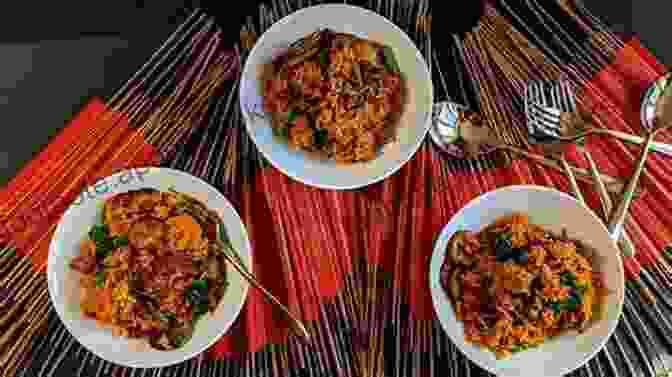 A Communal Plate Of Jollof Rice Served At A Family Gathering, Surrounded By Smiling Faces. Recipe Book: The Nigerian Ghanaian Jollof Recipe