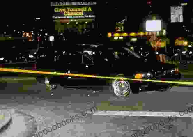 A Police Car At The Scene Of Tupac's Murder, Cordoning Off The Area For Investigation. The Killing Of Tupac Shakur