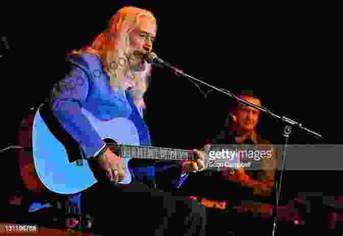 Charlie Landsborough Performing Live On Stage With His Guitar CHARLIE LANDSBOROUGH Storyteller Charlie Landsborough