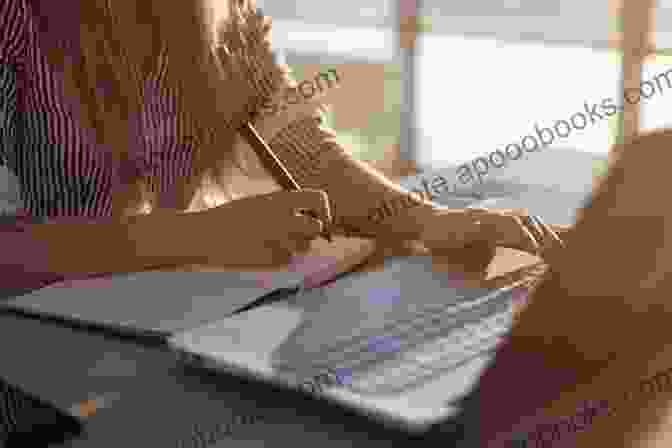 Image Of A Person Writing On A Laptop With A Book Next To Them Writing STEAM: Composition STEM And A New Humanities