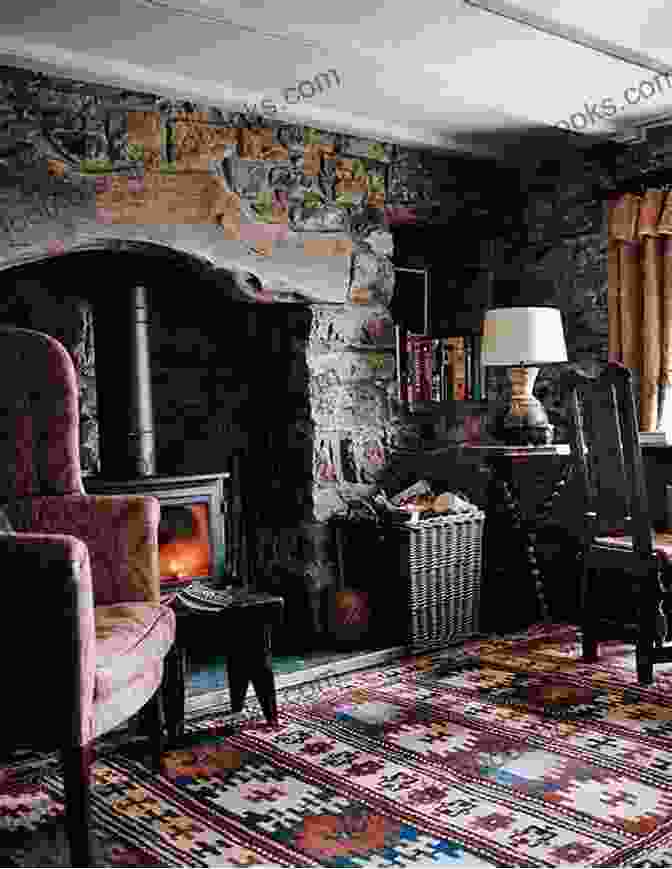 Interior Of A Cozy Cottage, Featuring Exposed Stone Walls, A Fireplace, And Antique Furnishings Le Roc A Village On The Dordogne