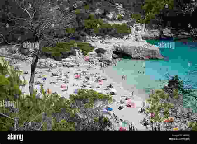 Menorca's Rugged Coastline, Framed By Azure Waters And Vibrant Cliffs. Walk Menorca Casey Stone